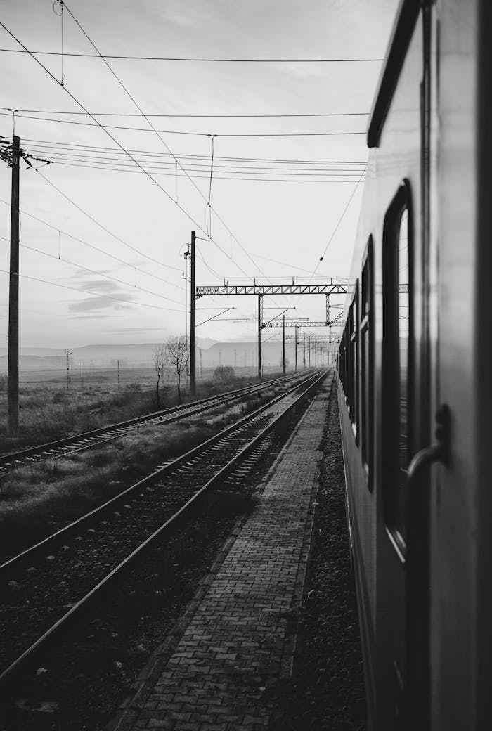 View of the Railway and the Side of a Train from a Train Window